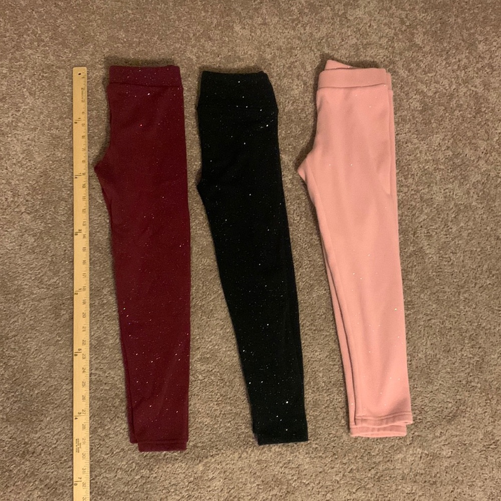 3 pair cozy fleece lined leggings.  Black Pink/ maroon are old navy 10-12.